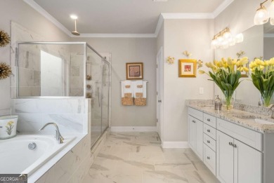 Located in Lakeview-Heron Bay's only gated section-this elegant on Canongate At Heron Bay in Georgia - for sale on GolfHomes.com, golf home, golf lot