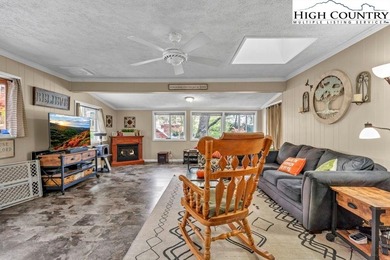 Welcome to 36 Larskpur, a beautiful mountain retreat nestled in on Land Harbor Golf Course in North Carolina - for sale on GolfHomes.com, golf home, golf lot