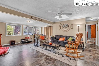 Welcome to 36 Larskpur, a beautiful mountain retreat nestled in on Land Harbor Golf Course in North Carolina - for sale on GolfHomes.com, golf home, golf lot