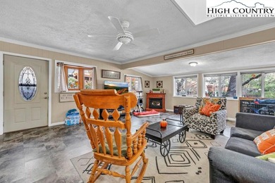 Welcome to 36 Larskpur, a beautiful mountain retreat nestled in on Land Harbor Golf Course in North Carolina - for sale on GolfHomes.com, golf home, golf lot