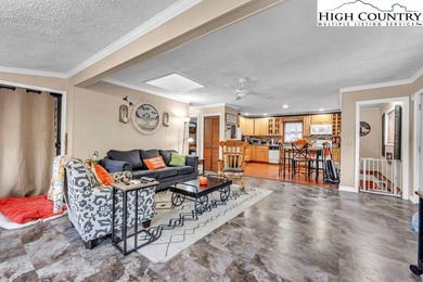 Welcome to 36 Larskpur, a beautiful mountain retreat nestled in on Land Harbor Golf Course in North Carolina - for sale on GolfHomes.com, golf home, golf lot