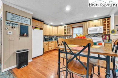 Welcome to 36 Larskpur, a beautiful mountain retreat nestled in on Land Harbor Golf Course in North Carolina - for sale on GolfHomes.com, golf home, golf lot