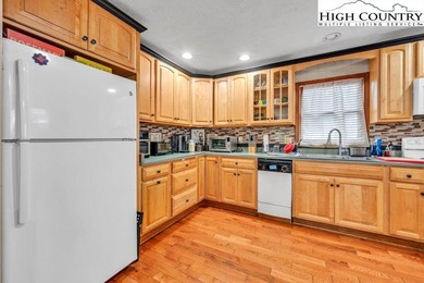 Welcome to 36 Larskpur, a beautiful mountain retreat nestled in on Land Harbor Golf Course in North Carolina - for sale on GolfHomes.com, golf home, golf lot