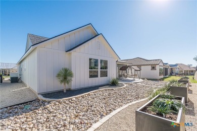 This stunning Modern Farmstyle home features both modern on Kissing Tree Golf Club in Texas - for sale on GolfHomes.com, golf home, golf lot