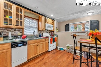 Welcome to 36 Larskpur, a beautiful mountain retreat nestled in on Land Harbor Golf Course in North Carolina - for sale on GolfHomes.com, golf home, golf lot