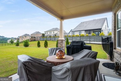 Located in Lakeview-Heron Bay's only gated section-this elegant on Canongate At Heron Bay in Georgia - for sale on GolfHomes.com, golf home, golf lot