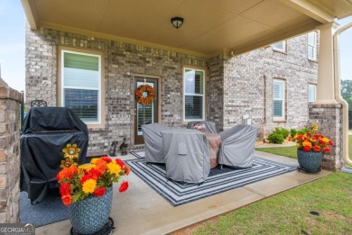 Located in Lakeview-Heron Bay's only gated section-this elegant on Canongate At Heron Bay in Georgia - for sale on GolfHomes.com, golf home, golf lot