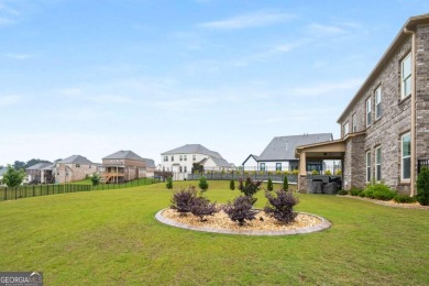 Located in Lakeview-Heron Bay's only gated section-this elegant on Canongate At Heron Bay in Georgia - for sale on GolfHomes.com, golf home, golf lot