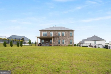 Located in Lakeview-Heron Bay's only gated section-this elegant on Canongate At Heron Bay in Georgia - for sale on GolfHomes.com, golf home, golf lot