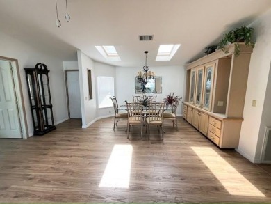 This Casa Grande model home has beautiful golf & water views on Del Tura Golf and Country Club in Florida - for sale on GolfHomes.com, golf home, golf lot