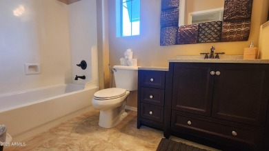 This beautifully maintained 4-bedroom, 3-bath home--with a on Blackstone Country Club in Arizona - for sale on GolfHomes.com, golf home, golf lot