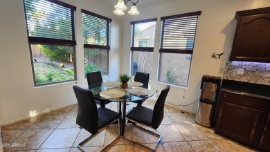 This beautifully maintained 4-bedroom, 3-bath home--with a on Blackstone Country Club in Arizona - for sale on GolfHomes.com, golf home, golf lot