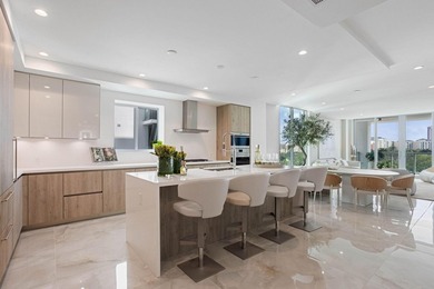 NEW FOUR BEDROOM PLUS DEN, HALF-FLOOR RESIDENCE IN THE HEART OF on  in Florida - for sale on GolfHomes.com, golf home, golf lot