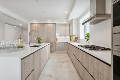 NEW FOUR BEDROOM PLUS DEN, HALF-FLOOR RESIDENCE IN THE HEART OF on Boca Raton Resort and Club in Florida - for sale on GolfHomes.com, golf home, golf lot