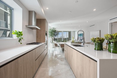 NEW FOUR BEDROOM PLUS DEN, HALF-FLOOR RESIDENCE IN THE HEART OF on Boca Raton Resort and Club in Florida - for sale on GolfHomes.com, golf home, golf lot