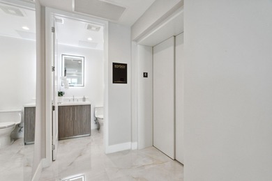 NEW FOUR BEDROOM PLUS DEN, HALF-FLOOR RESIDENCE IN THE HEART OF on Boca Raton Resort and Club in Florida - for sale on GolfHomes.com, golf home, golf lot