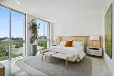 NEW FOUR BEDROOM PLUS DEN, HALF-FLOOR RESIDENCE IN THE HEART OF on  in Florida - for sale on GolfHomes.com, golf home, golf lot