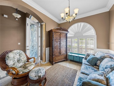 One or more photo(s) has been virtually staged. WATERFRONT on Lake Ashton Golf Club in Florida - for sale on GolfHomes.com, golf home, golf lot