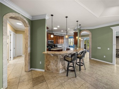 One or more photo(s) has been virtually staged. WATERFRONT on Lake Ashton Golf Club in Florida - for sale on GolfHomes.com, golf home, golf lot