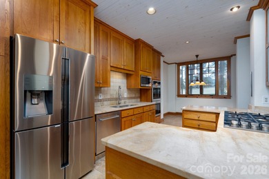 Welcome home to resort living in what feels like your mountain on Old North State Club at Uwharrie Point Golf community in North Carolina - for sale on GolfHomes.com, golf home, golf lot