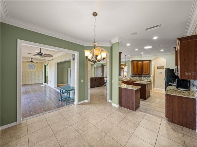 One or more photo(s) has been virtually staged. WATERFRONT on Lake Ashton Golf Club in Florida - for sale on GolfHomes.com, golf home, golf lot