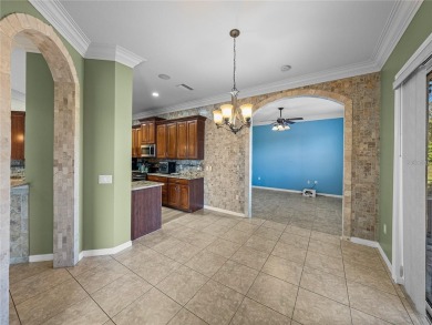 One or more photo(s) has been virtually staged. WATERFRONT on Lake Ashton Golf Club in Florida - for sale on GolfHomes.com, golf home, golf lot