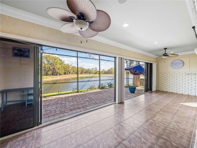 One or more photo(s) has been virtually staged. WATERFRONT on Lake Ashton Golf Club in Florida - for sale on GolfHomes.com, golf home, golf lot