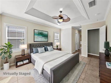 One or more photo(s) has been virtually staged. WATERFRONT on Lake Ashton Golf Club in Florida - for sale on GolfHomes.com, golf home, golf lot