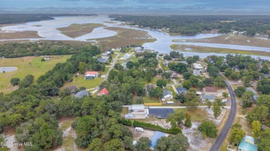 Discover the perfect blend of convenience and coastal living on Carolina National Golf Club in North Carolina - for sale on GolfHomes.com, golf home, golf lot