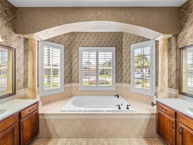 One or more photo(s) has been virtually staged. WATERFRONT on Lake Ashton Golf Club in Florida - for sale on GolfHomes.com, golf home, golf lot