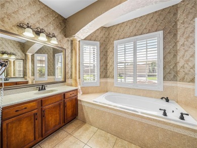 One or more photo(s) has been virtually staged. WATERFRONT on Lake Ashton Golf Club in Florida - for sale on GolfHomes.com, golf home, golf lot