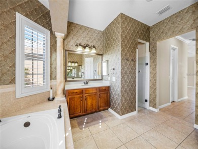 One or more photo(s) has been virtually staged. WATERFRONT on Lake Ashton Golf Club in Florida - for sale on GolfHomes.com, golf home, golf lot