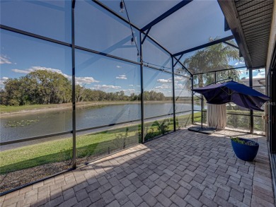 One or more photo(s) has been virtually staged. WATERFRONT on Lake Ashton Golf Club in Florida - for sale on GolfHomes.com, golf home, golf lot