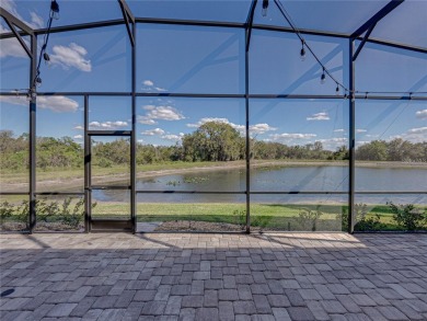 One or more photo(s) has been virtually staged. WATERFRONT on Lake Ashton Golf Club in Florida - for sale on GolfHomes.com, golf home, golf lot