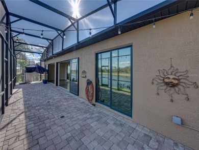 One or more photo(s) has been virtually staged. WATERFRONT on Lake Ashton Golf Club in Florida - for sale on GolfHomes.com, golf home, golf lot