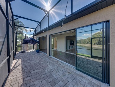 One or more photo(s) has been virtually staged. WATERFRONT on Lake Ashton Golf Club in Florida - for sale on GolfHomes.com, golf home, golf lot