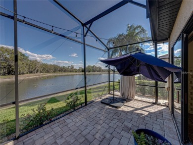 One or more photo(s) has been virtually staged. WATERFRONT on Lake Ashton Golf Club in Florida - for sale on GolfHomes.com, golf home, golf lot
