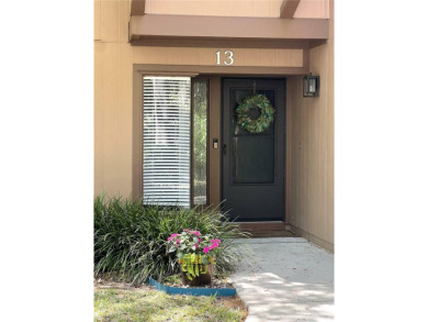 Escape to a peaceful, tree-lined oasis in this beautifully on Palm Harbor Golf Club in Florida - for sale on GolfHomes.com, golf home, golf lot