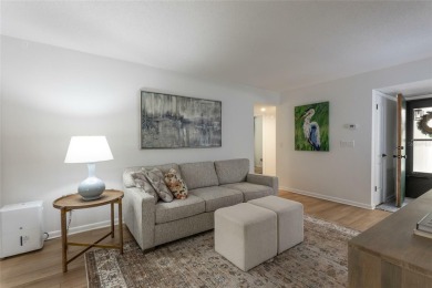 Escape to a peaceful, tree-lined oasis in this beautifully on Palm Harbor Golf Club in Florida - for sale on GolfHomes.com, golf home, golf lot