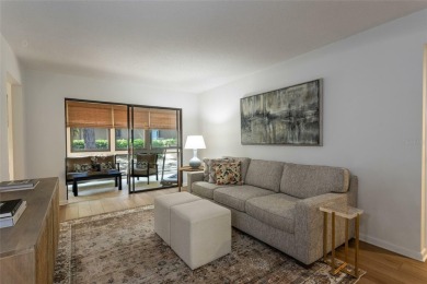 Escape to a peaceful, tree-lined oasis in this beautifully on Palm Harbor Golf Club in Florida - for sale on GolfHomes.com, golf home, golf lot