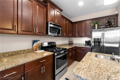 Discover this beautifully maintained, TURNKEY 2-bedroom + den on Heritage Palms Golf and Country Club in Florida - for sale on GolfHomes.com, golf home, golf lot