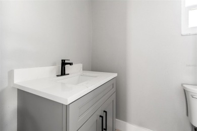 Freshly renovated and ready for a new chapter, 6070 Denver St NE on Mangrove Bay Golf Course in Florida - for sale on GolfHomes.com, golf home, golf lot