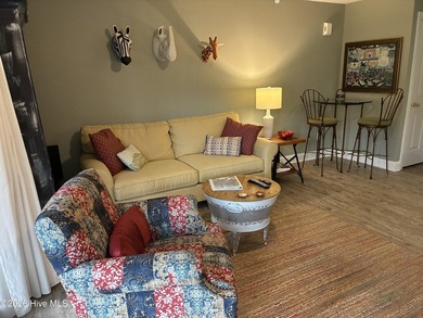 Precious one-bedroom condo featuring recent renovations and on Sound Golf Links at Albemarle Plantation in North Carolina - for sale on GolfHomes.com, golf home, golf lot