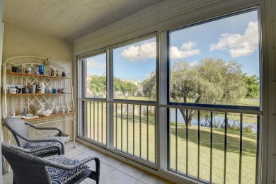 REMODELED GORGEOUS DOUBLE LAKE VIEW FROM 2ND FLOOR. NEW KITCHEN on Marina Lakes Golf Course in Florida - for sale on GolfHomes.com, golf home, golf lot