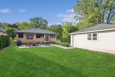 With elegant simplicity, this all brick home on a breathtaking on Hinsdale Golf Club in Illinois - for sale on GolfHomes.com, golf home, golf lot