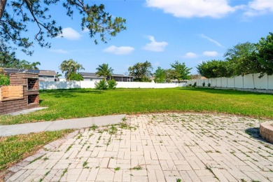 Freshly renovated and ready for a new chapter, 6070 Denver St NE on Mangrove Bay Golf Course in Florida - for sale on GolfHomes.com, golf home, golf lot