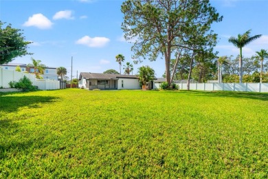 Freshly renovated and ready for a new chapter, 6070 Denver St NE on Mangrove Bay Golf Course in Florida - for sale on GolfHomes.com, golf home, golf lot