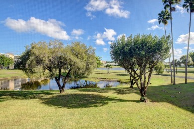 REMODELED GORGEOUS DOUBLE LAKE VIEW FROM 2ND FLOOR. NEW KITCHEN on Marina Lakes Golf Course in Florida - for sale on GolfHomes.com, golf home, golf lot