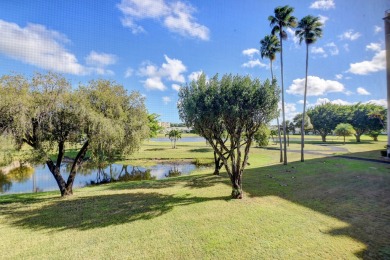 REMODELED GORGEOUS DOUBLE LAKE VIEW FROM 2ND FLOOR. NEW KITCHEN on Marina Lakes Golf Course in Florida - for sale on GolfHomes.com, golf home, golf lot