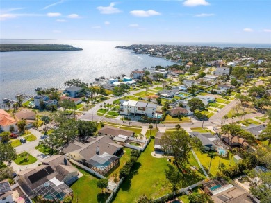 Freshly renovated and ready for a new chapter, 6070 Denver St NE on Mangrove Bay Golf Course in Florida - for sale on GolfHomes.com, golf home, golf lot